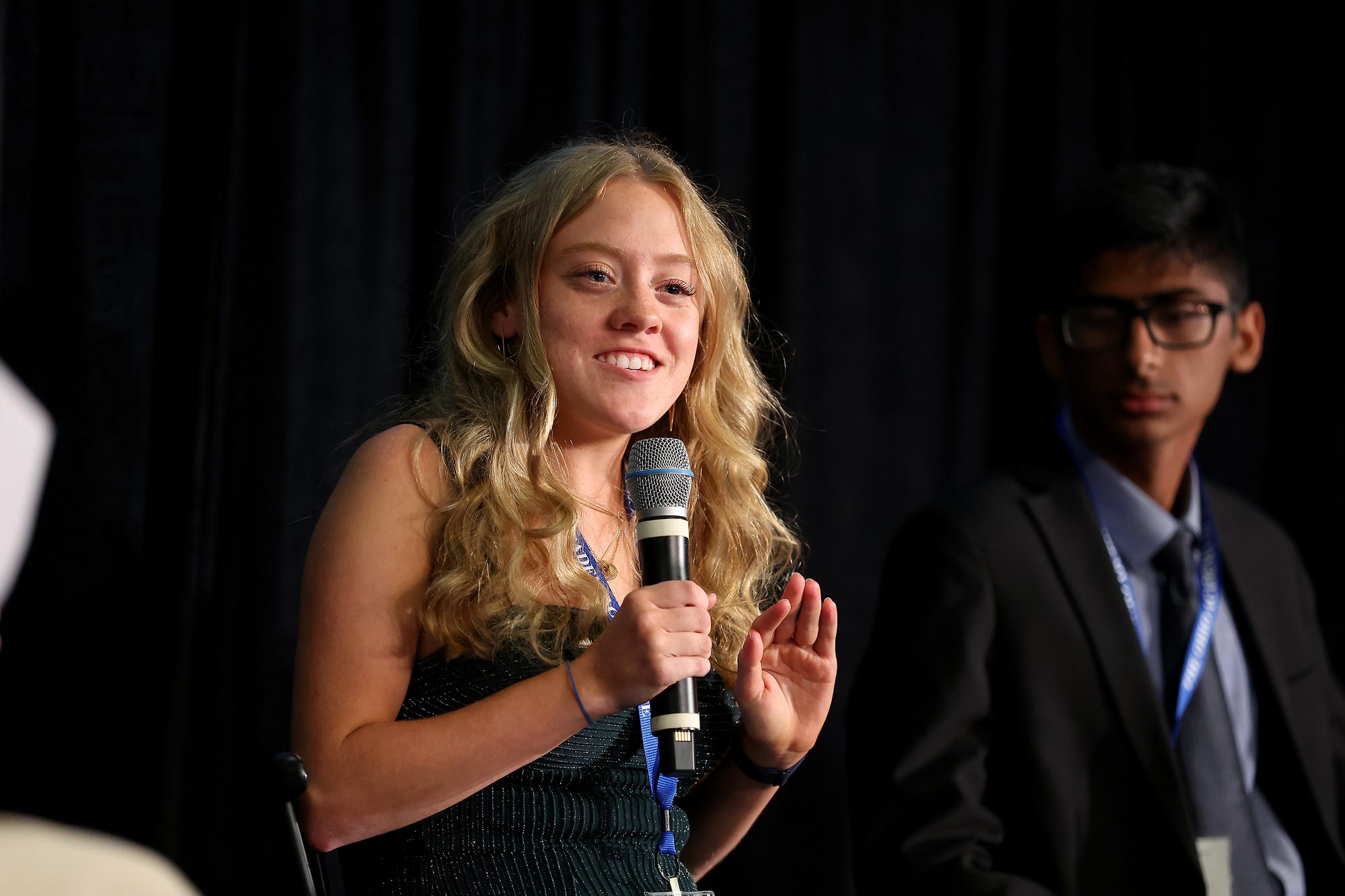 Kyla Fallis presenting microbial fuel cell research on the student panel at COSI Big Science Day, Columbus, 2025